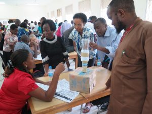 Master of education students from Aga Khan University discuss their Maker Day project assigned to them by UBC’s Susan Crichton during the Maker Days workshop in Tanzania.