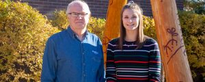 Recipient Sydney Fender next to Bob Bissell, Kiwanis Society